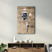 Banksy - Man hanging from a window | Glass Wall Art - Artdesigna