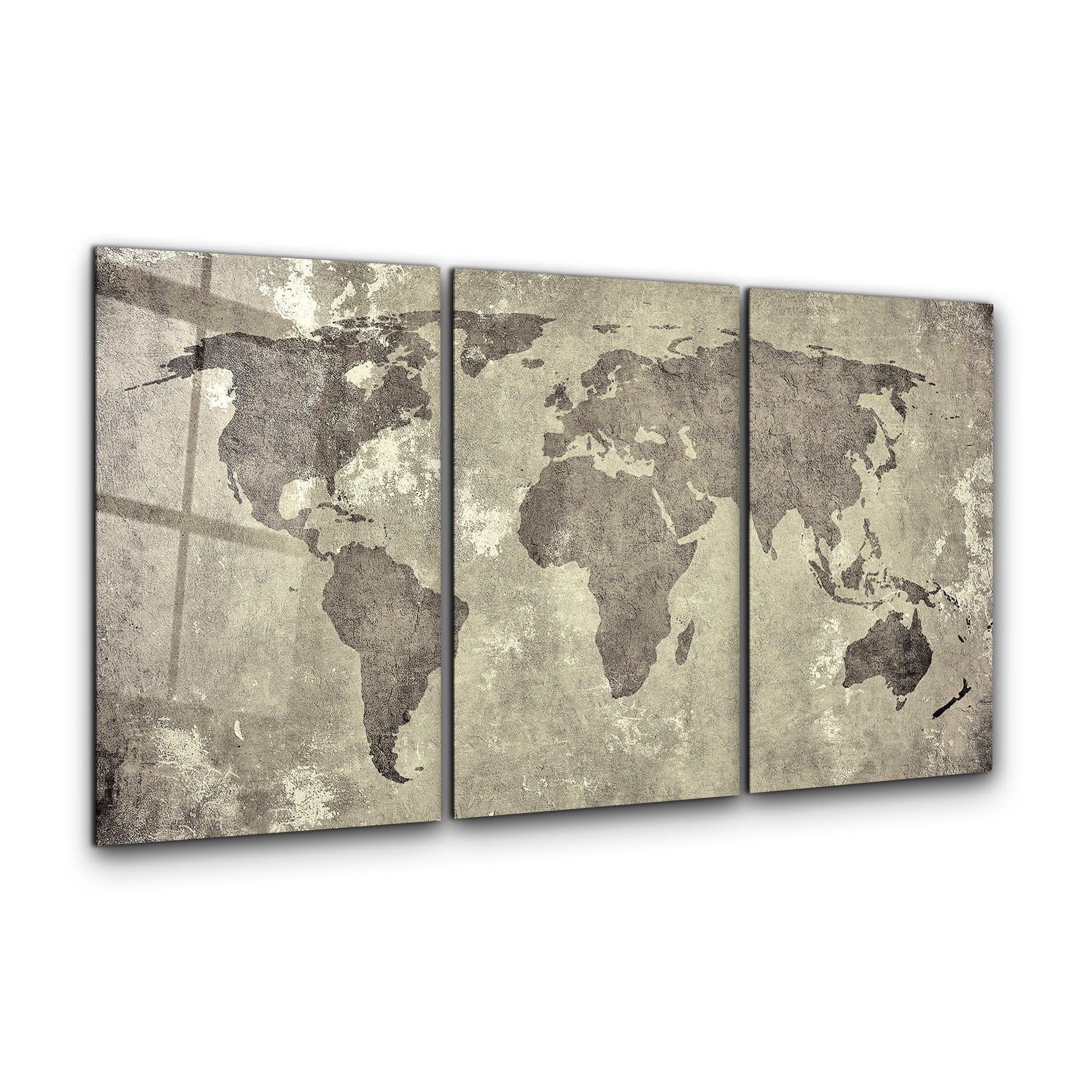 Vintage world map trio glass wall art by Artdesigna, featuring three framed map images with detailed antique-style designs.