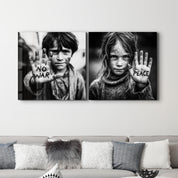 Glass wall art featuring portraits from the Voices of Peace Protest Collection by Artdesigna, displayed on a clear glass panel.
