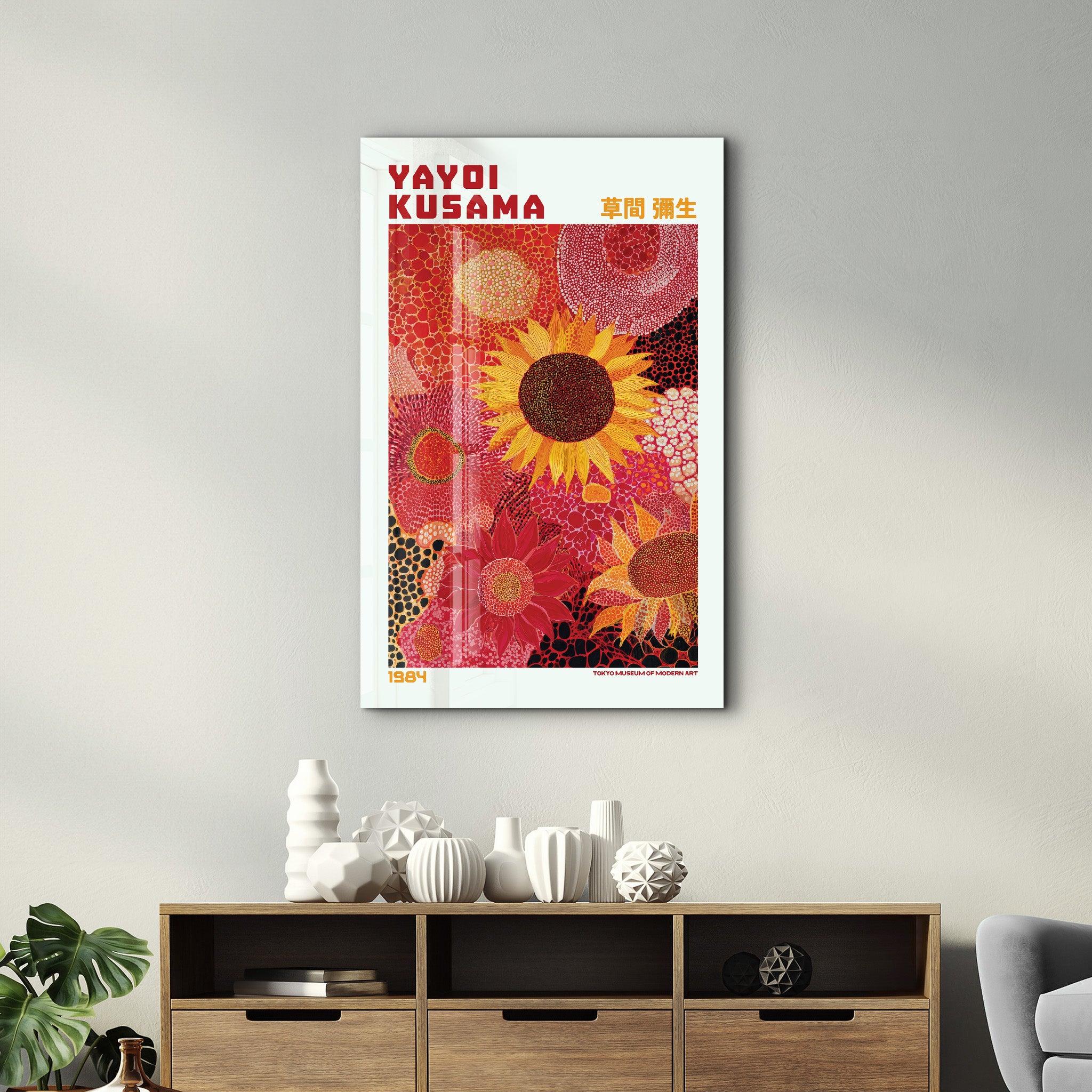Colorful Yayoi Kusama sunflower design in glass wall art by Artdesigna, showcasing polka dots and vibrant patterns.
