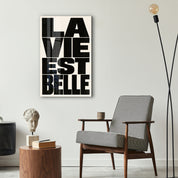 La Vie Est Belle glass wall art by Artdesigna displayed as elegant lifestyle decorասն