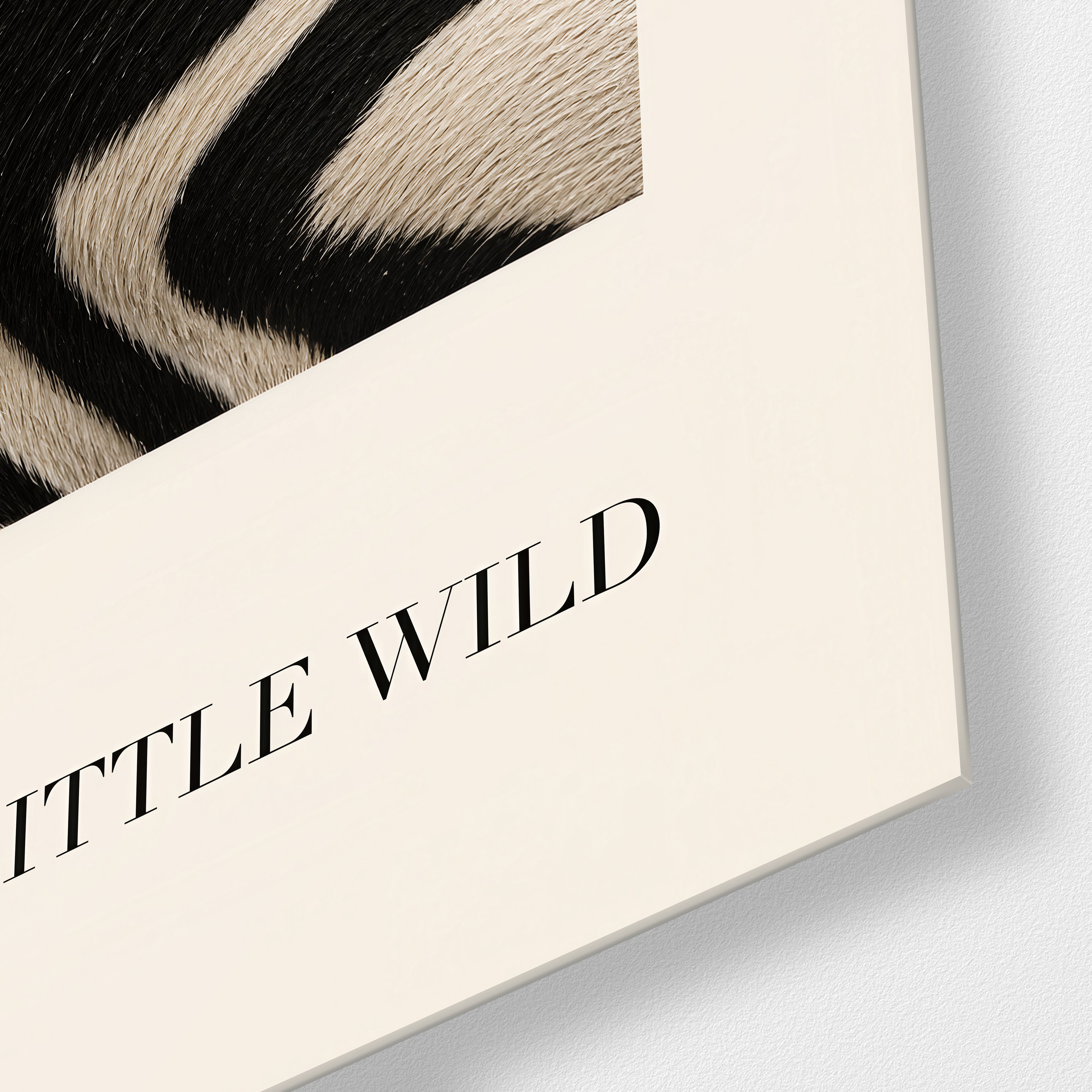 Stay a Little Wild glass wall art by Artdesigna, close-up view of the printed design on glass