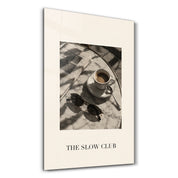 The Slow Club Artdesigna glass wall art with colorful abstract design on a clear glass panel