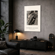 Leisure Is a Luxury glass wall art by Artdesigna displayed in a corner interior setting