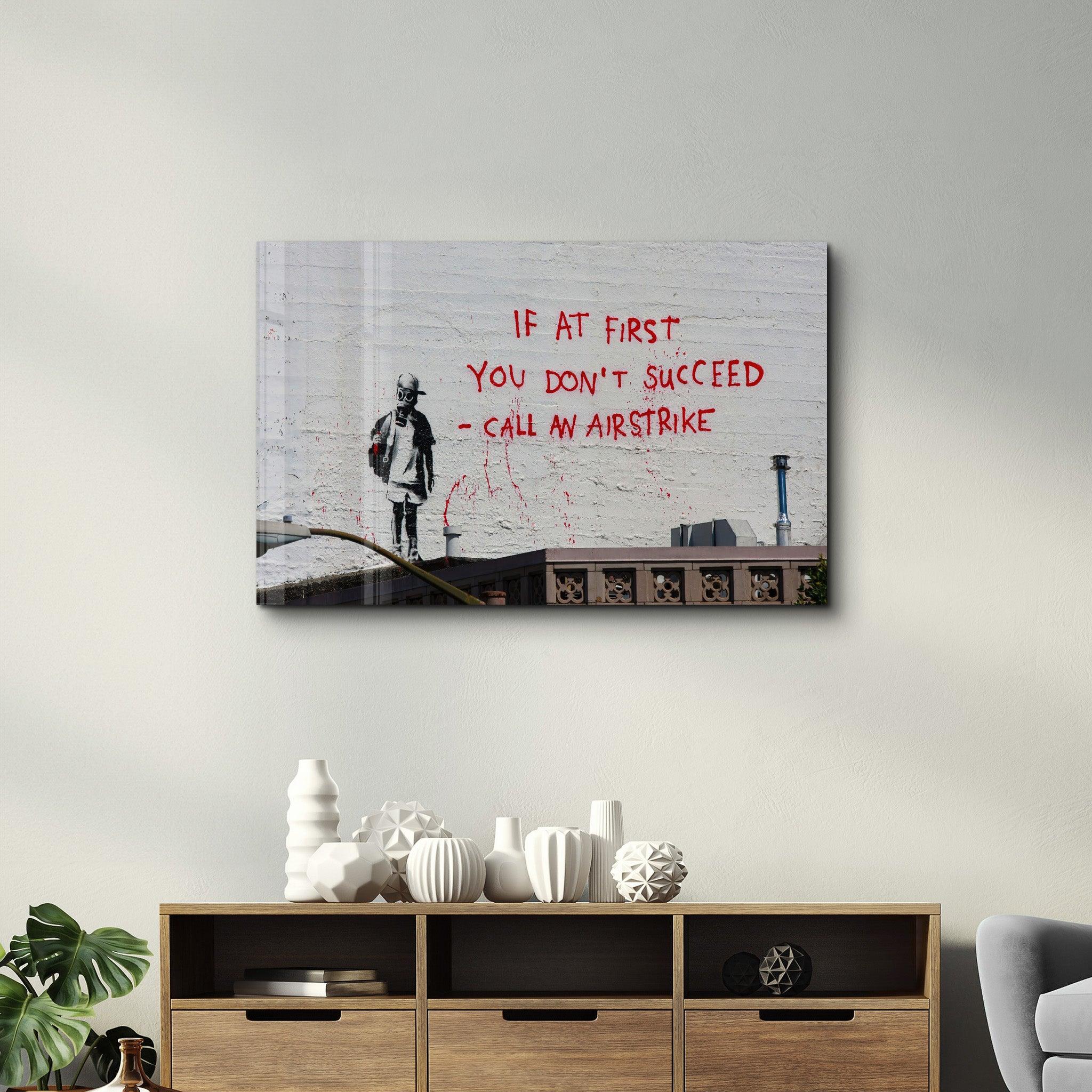 Banksy - Call an Airstrike | Glass Wall Art - Artdesigna