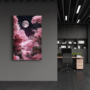 Glass wall art by Artdesigna featuring a moon rising over pink clouds, displayed on a sleek glass panel.