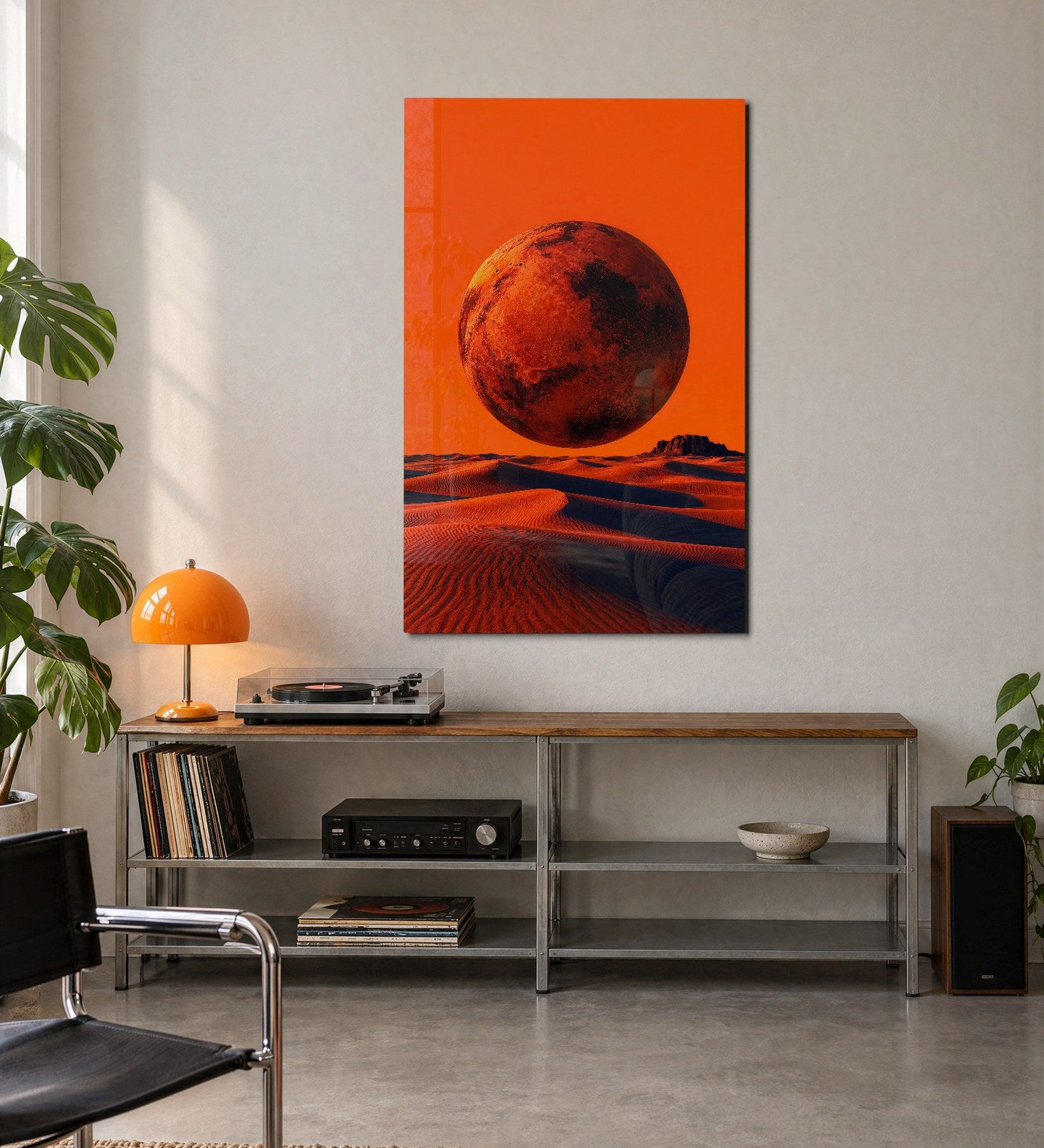 Glass wall art featuring a rust moon above sand scene by Artdesigna, displayed on a modern living room wall.