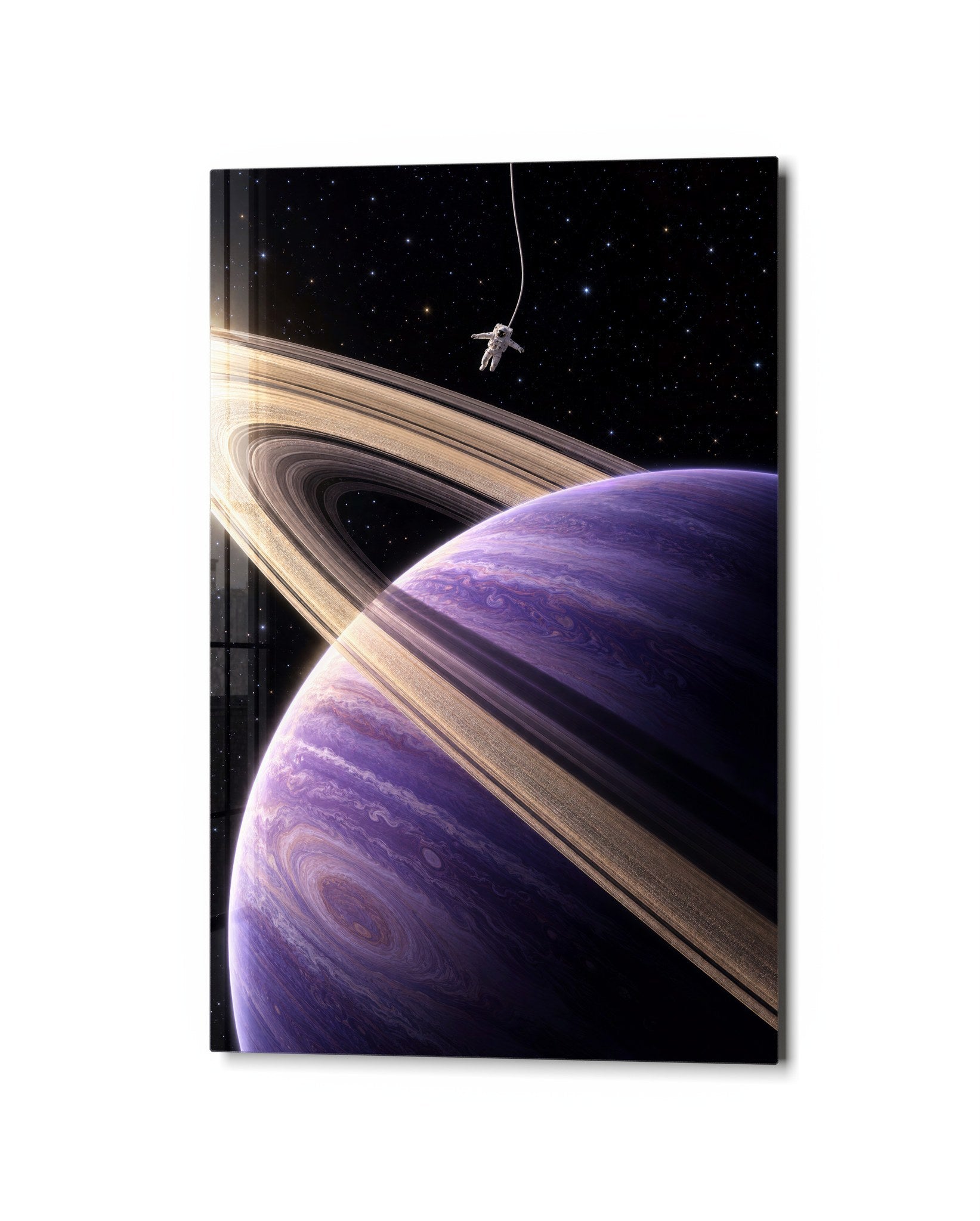 Small astronaut glass wall art with large rings, featuring a modern design by Artdesigna displayed against a neutral background.