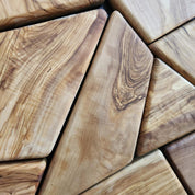 Handmade olive wood geometric wall sculpture by Artdesigna, showcasing intricate wooden wall art with natural grain details.